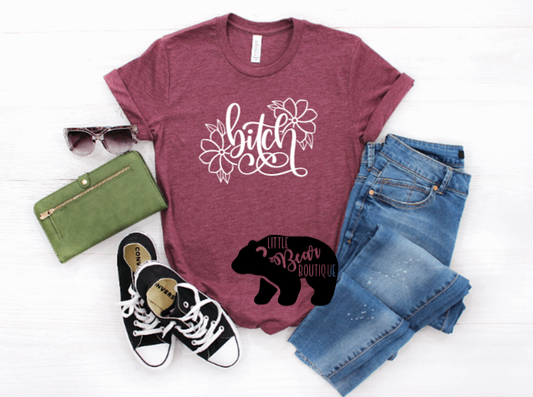 Heather Maroon short-sleeved t-shirt with floral graphic and a hand-lettered word - bitch.